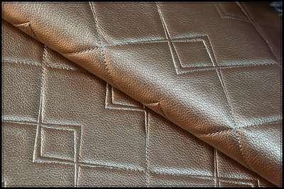 廠家直銷現貨供應移門PU面料與硬包皮革裝飾革 環保阻燃皮料的全方位解析